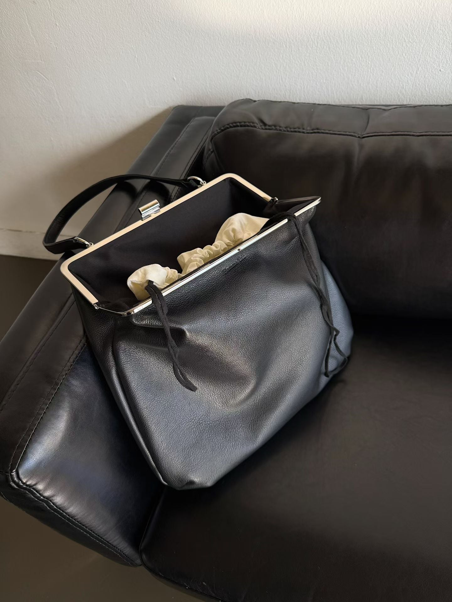 The Lady Clamp Cow Leather Bag