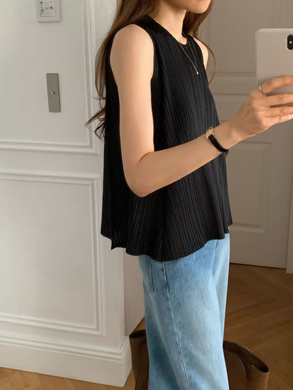Soft Sheen Pleated Peplum Blouse