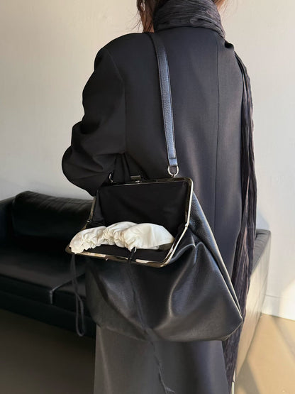 The Lady Clamp Cow Leather Bag