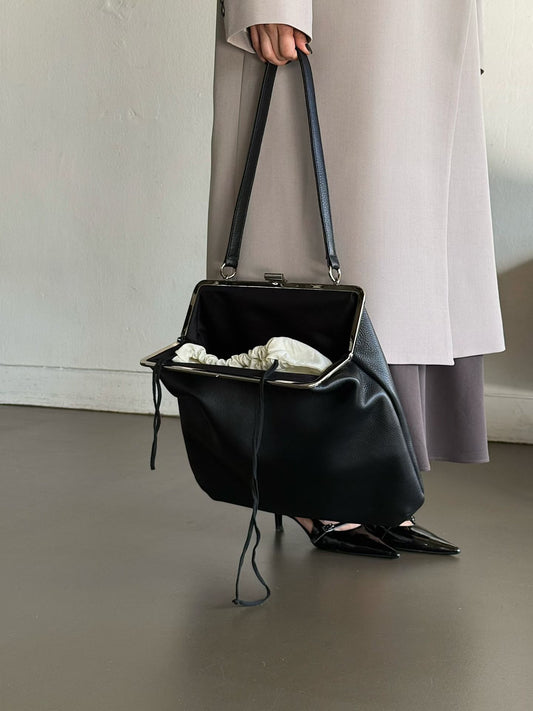 The Lady Clamp Cow Leather Bag