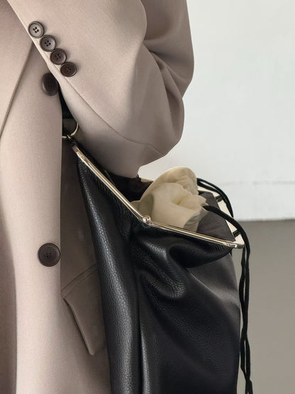The Lady Clamp Cow Leather Bag