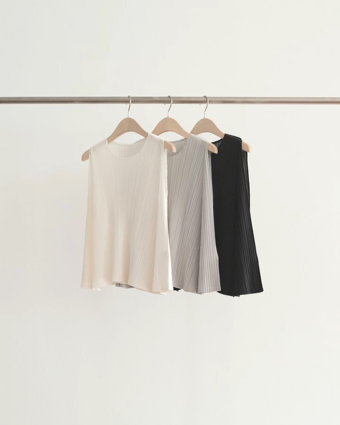 Soft Sheen Pleated Peplum Blouse