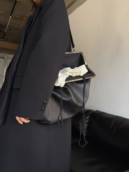 The Lady Clamp Cow Leather Bag