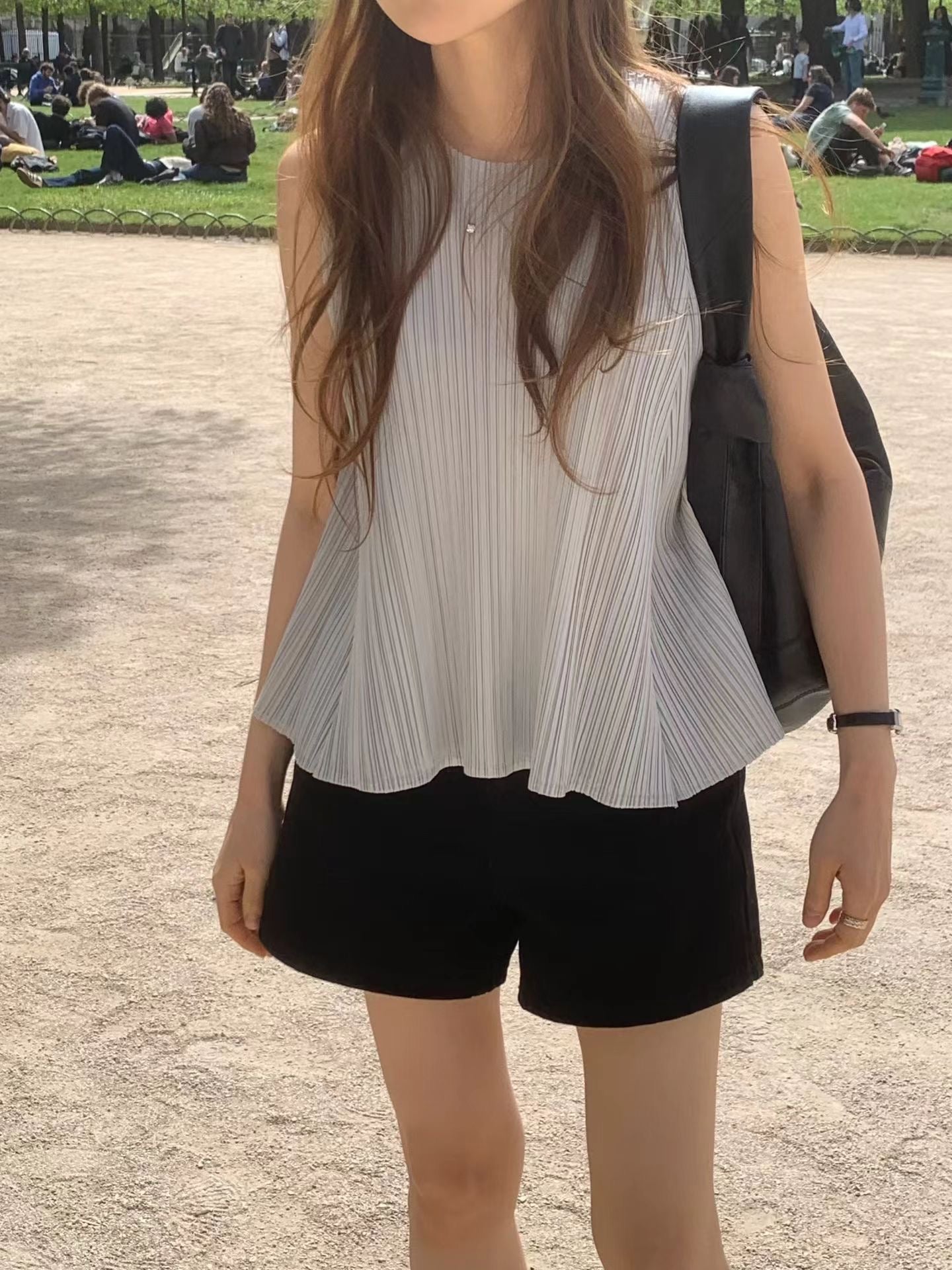 Soft Sheen Pleated Peplum Blouse