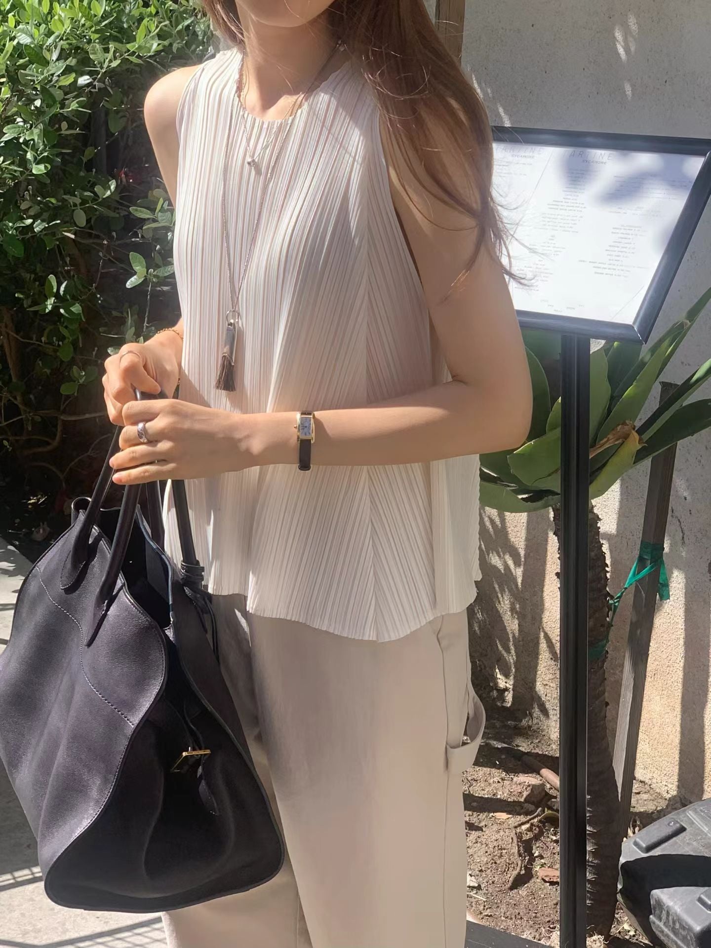 Soft Sheen Pleated Peplum Blouse